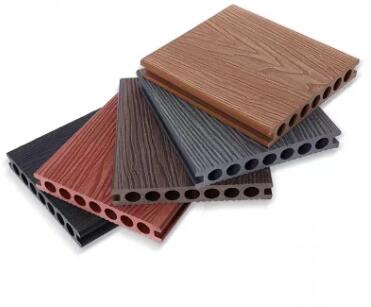 What are the primary materials used in the production of plastic flooring
