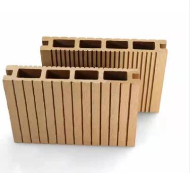 How does plastic flooring compare to traditional hardwood flooring in terms of appearance and durability